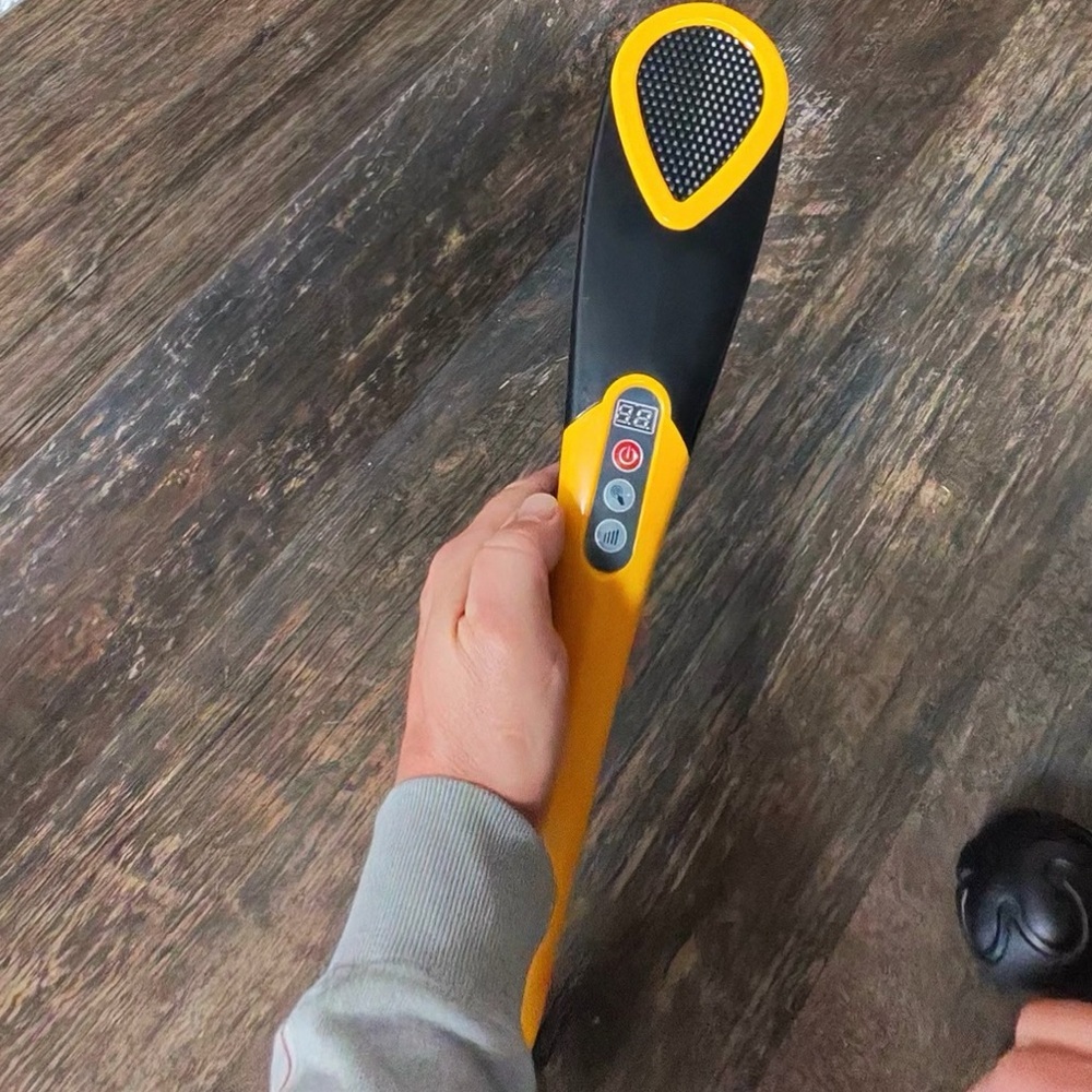 Yellow and Black Handheld Massager‎